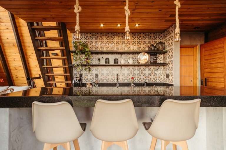 Warm and inviting cottage kitchen with wooden decor and modern design elements.